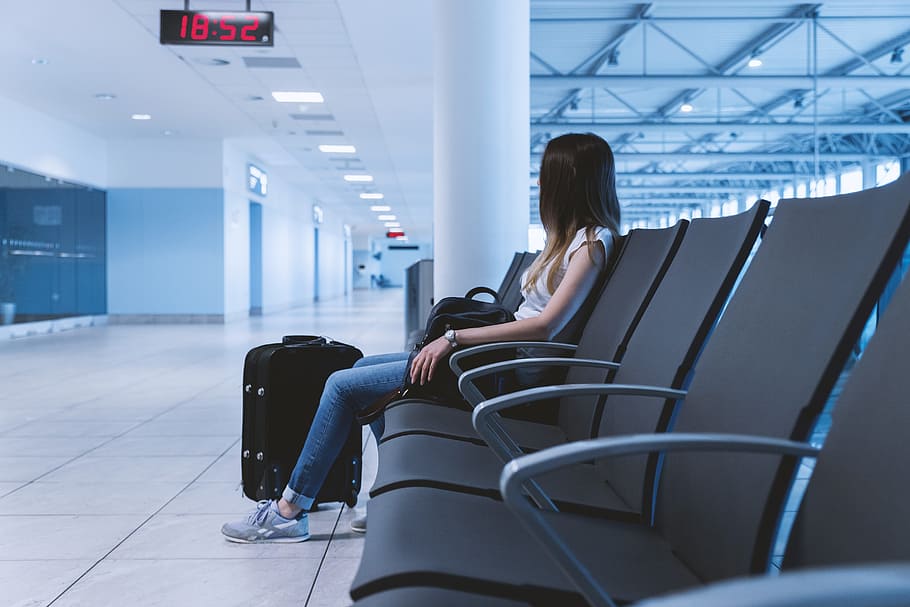 young, girl, long, hair, sitting, airport., airport, seat, chair, indoors