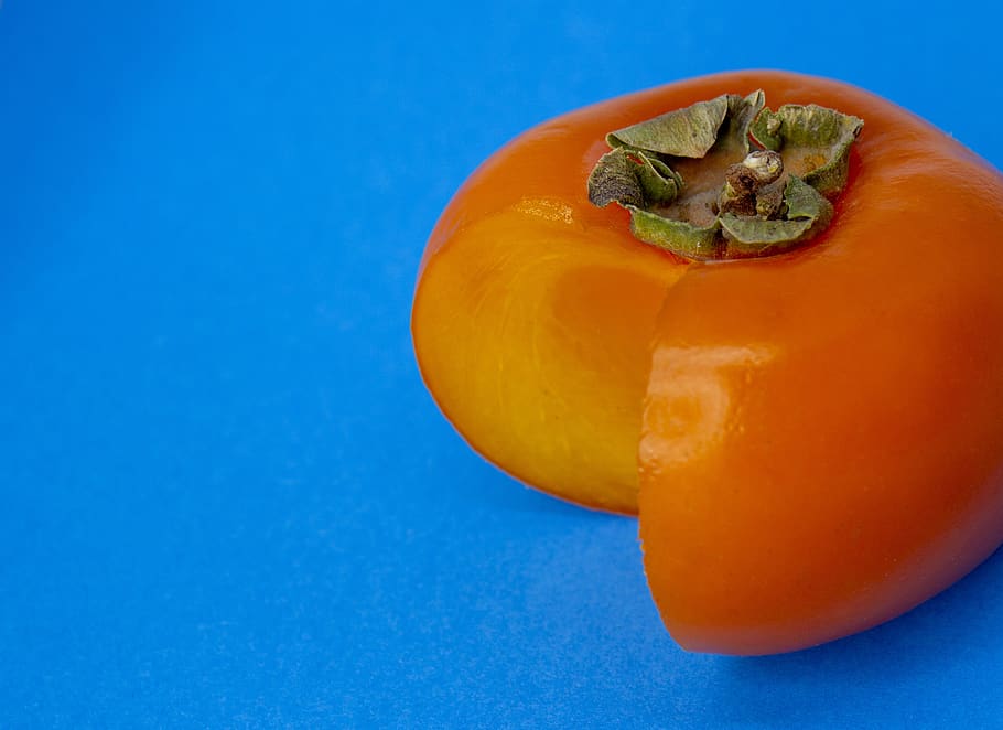 persimmon, orange, blue, complementary color, color, complementary, fruit, sweet, ripe, juicy