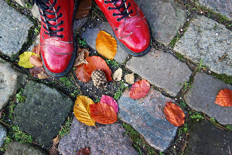 foot, shoes, red shoes, patent leather, patent shoes, standing, doctor martens, cobbles, leaves, autumn leaves