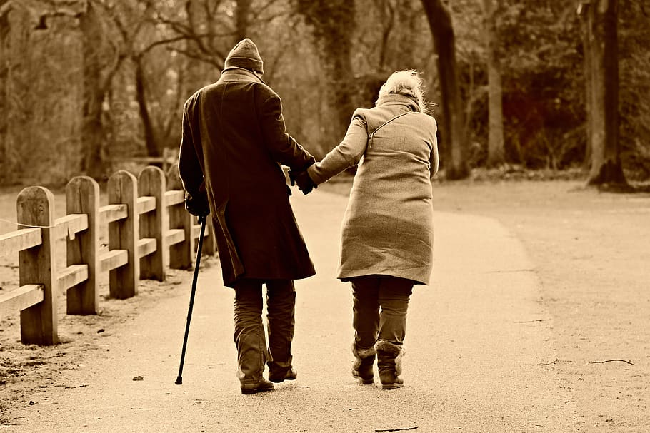 people, man, woman, couple, walking, side by side, together, togetherness, walking stick, helping