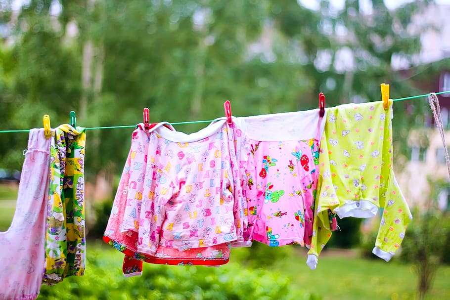 Clothes, rope, green, hanging, dry, childrens, clothing, clothesline, laundry, focus on foreground