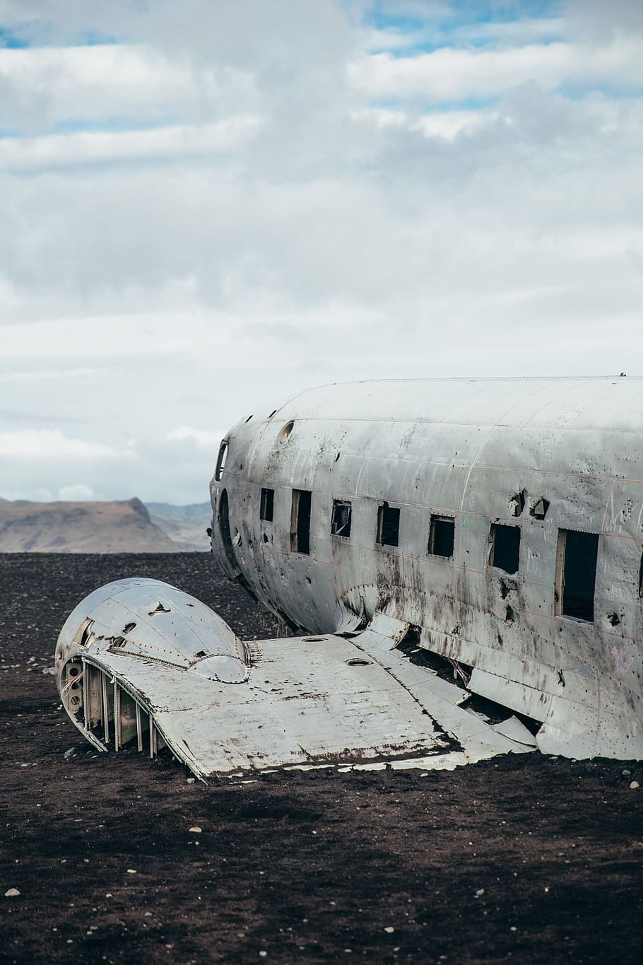 crashed, aircraft wreckage, field, airplane, cockpit, crushed, damage, desert, mountain, outdoors