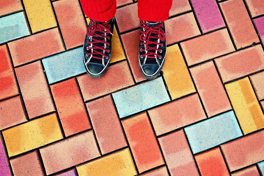 feet, female, shoes, sneakers, standing, street, paving, brick paving, brick surface, multi colored bricks