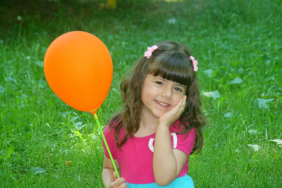 girl, stand, standing, balloon, orange, pink, portrait, childhood, child, smiling