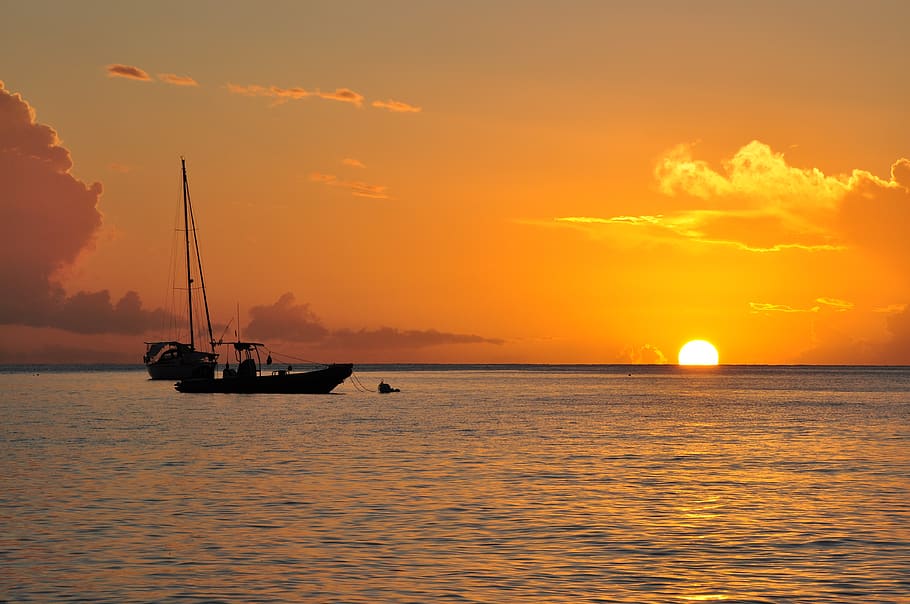 sunset, body of water, sea, twilight, sun, guadeloupe, sky, water, nautical vessel, transportation