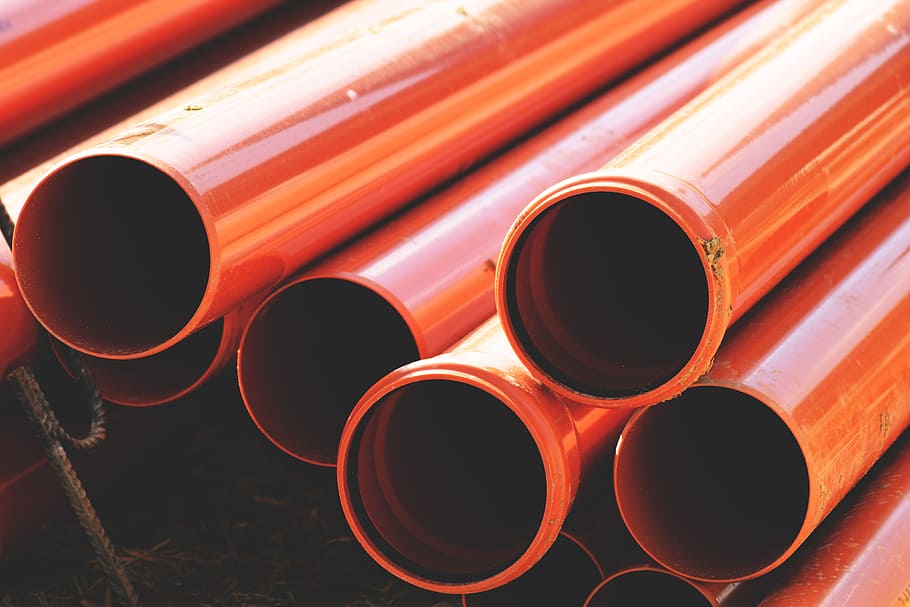 construction pipes, various, construction, pipe - tube, close-up, orange color, industry, outdoors, still life, circle