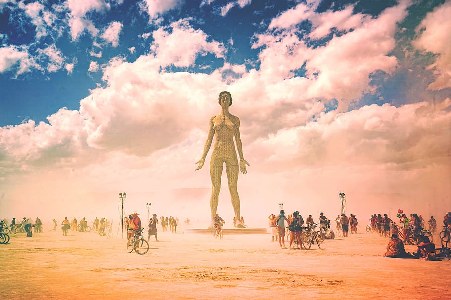 people, crowd, group, friends, family, statue, blue, sky, clouds, bike