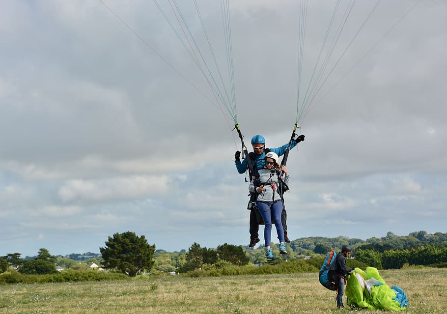 paragliding, paraglider landing, tandem paragliding, landing, hobbies, sport, sky, real people, adventure, men
