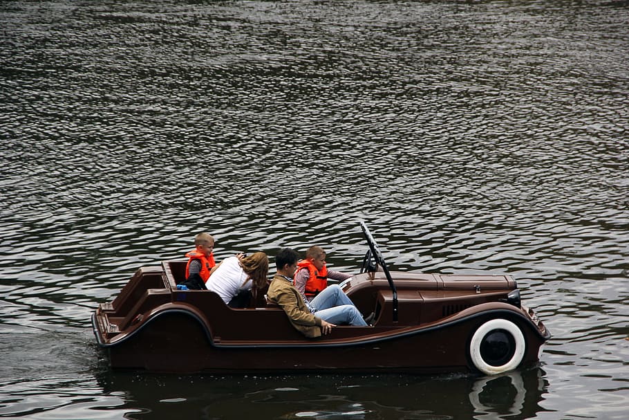 car, boat, prague, river, water, transportation, nautical vessel, mode of transportation, two people, sitting