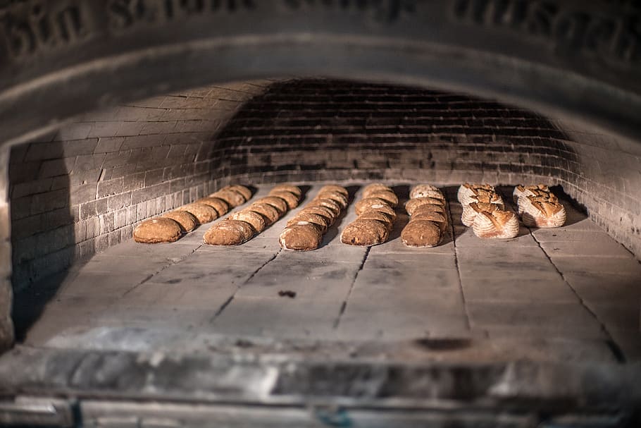 bread in oven, food and Drink, baking, food, selective focus, bread, indoors, bakery, store, large group of objects