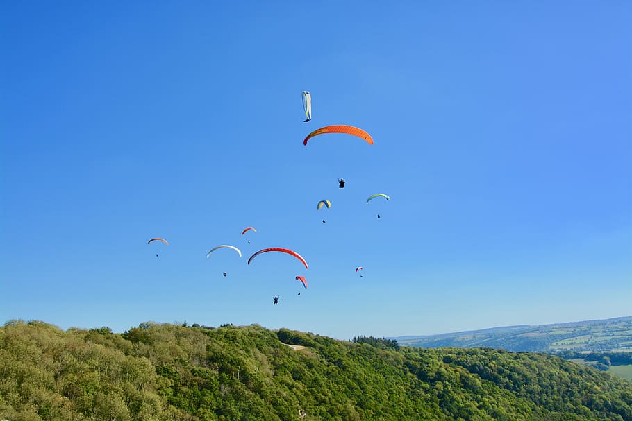 paragliding, paraglider, paragliders, panoramic views, flying site, aircraft, adventure, entertainment, sails wings multi-color, blue sky