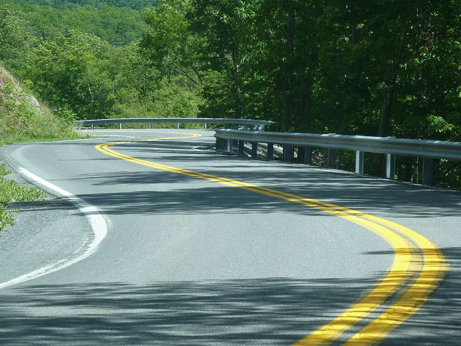 road, twisty, turns, twisty road, windy road, yellow lines, mountain road, transportation, sign, tree