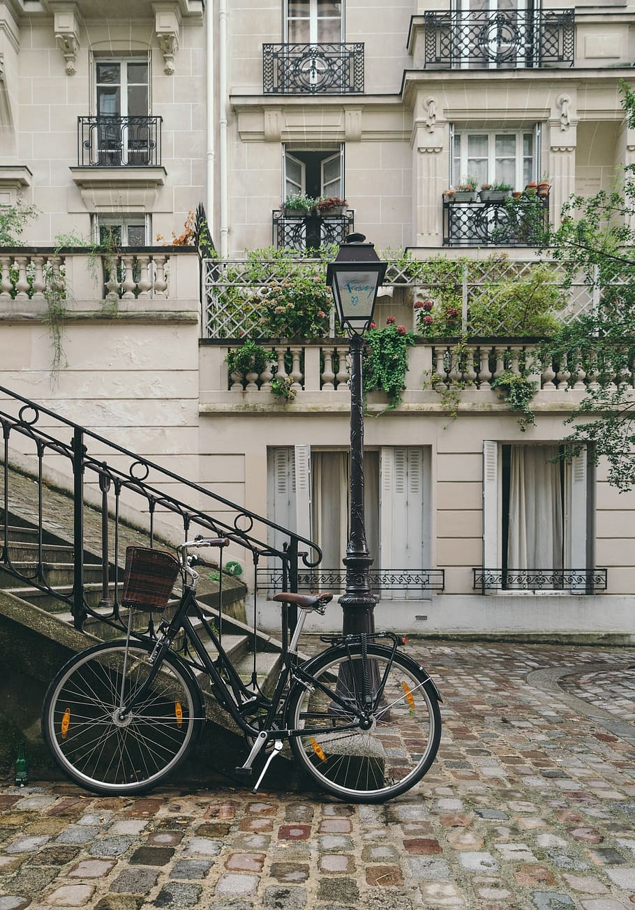 bicycle, building, city, cobblestone street, exterior, facade, outdoors, paris, urban, vintage