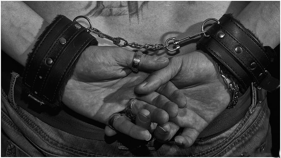 weapon, people, man, crime, handcuffs, chains, human hand, hand, human body part, real people