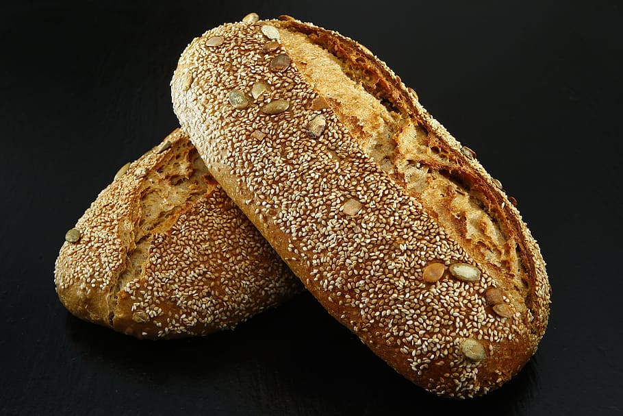 bread, baked, crust, seeds, food and drink, food, seed, freshness, black background, indoors