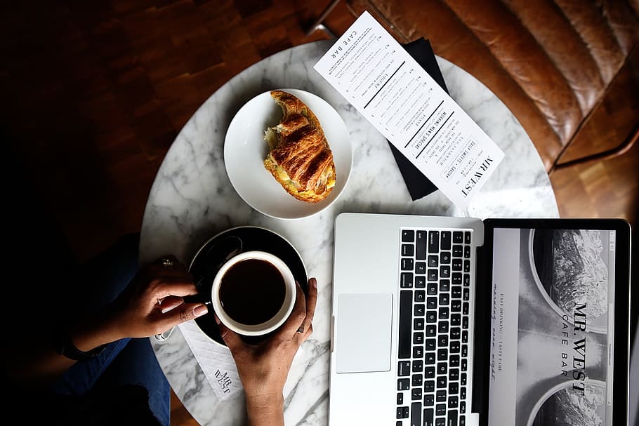 breakfast, pastry, coffee, laptop, table, marble, hands, people, person, food