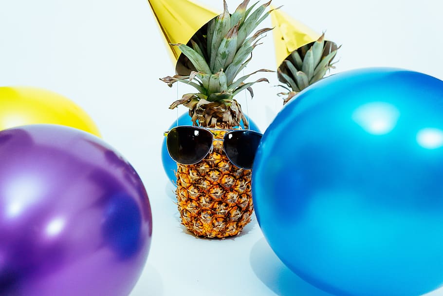 pineapple, pineapples, party hats, party, balloons, confetti, gold, golden, happy birthday, celebration