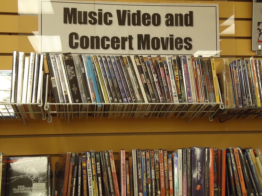 dvd, movies, display, rack, shelf, shelves, wall, sign, store, shop