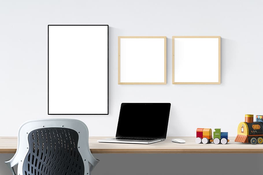 poster, frame, laptop, toys, chair, technology, computer, table, furniture, business