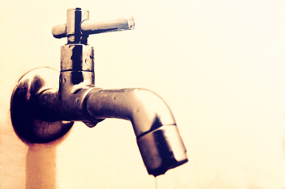 water tap, plumbing, water, close-up, indoors, metal, single object, technology, studio shot, safety