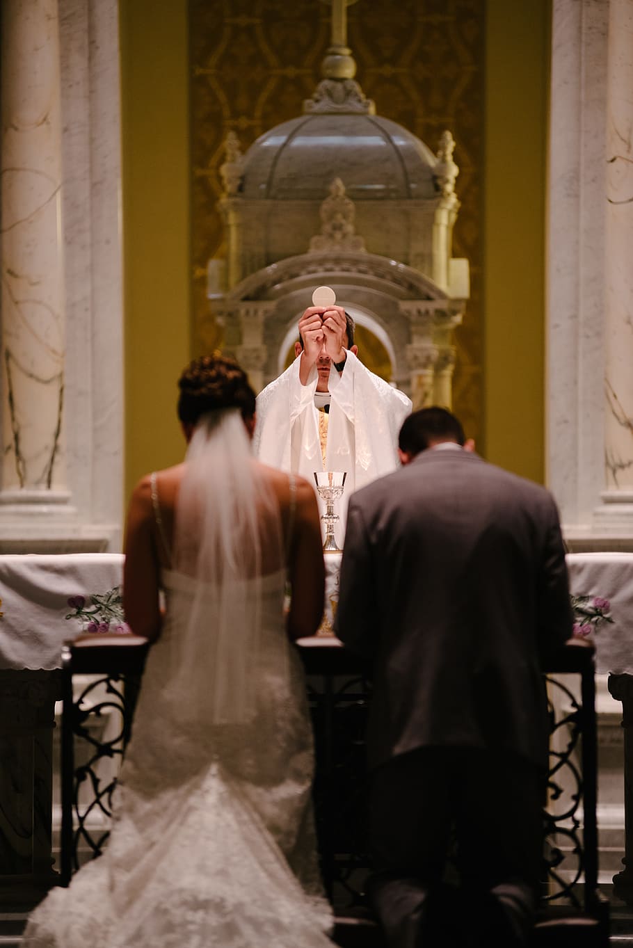 wedding, mass, priest, bride, groom, gown, suit, altar, hostia, ceremony