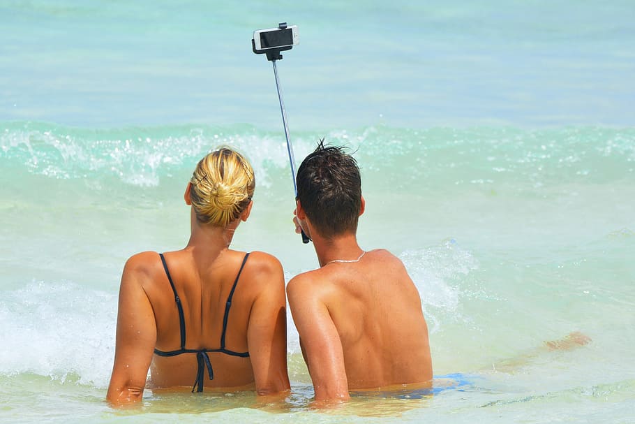 selfie in sea, peopleTravel, beach, couple, holiday, holidays, man, ocean, sea, selfie