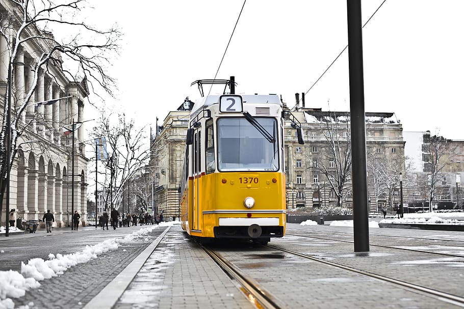 yellow, tram, snowy, road, day time, cityscape, cold, fall, line, snow