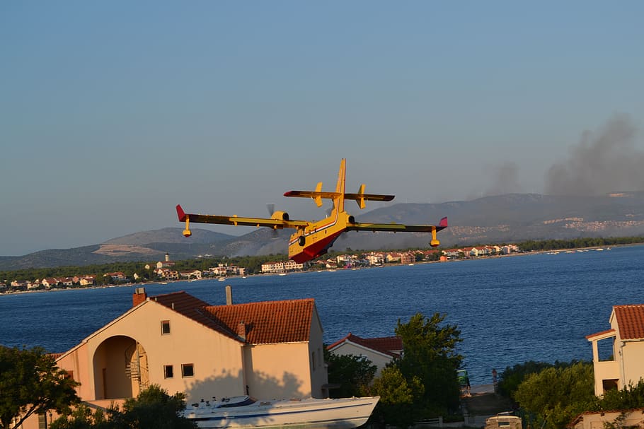 canadair firefighting plane, croatia, dalmatia, fire, water, architecture, built structure, sky, building exterior, transportation