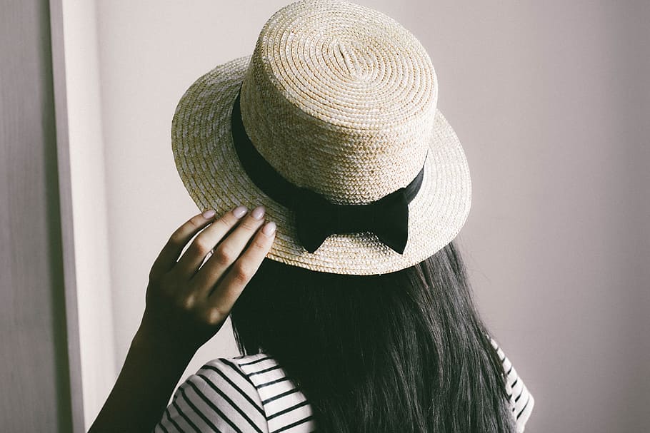gray, hats, white, women, adult, headshot, one person, hat, obscured face, clothing