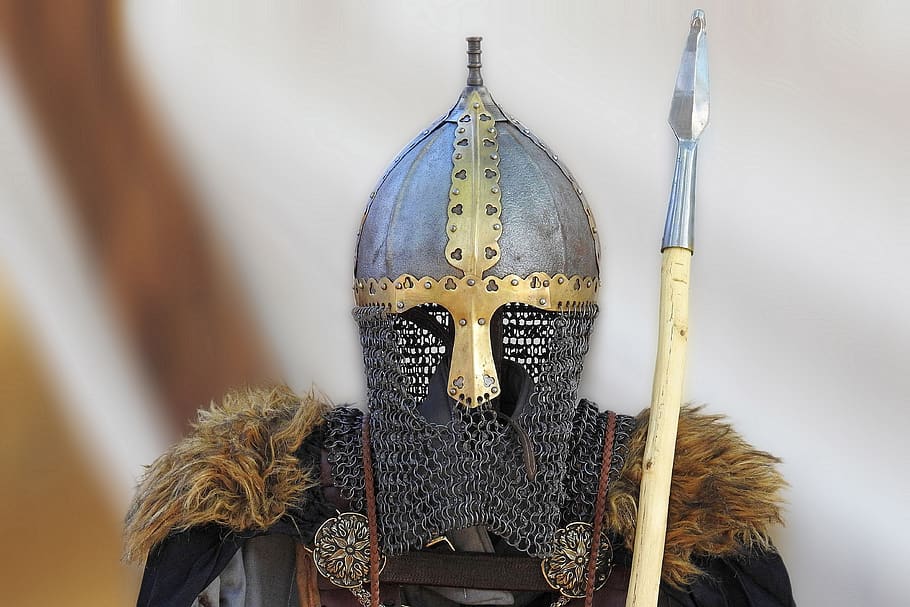armor, knight, metal, weapon, spear, religion, hanging, belief, indoors, spirituality
