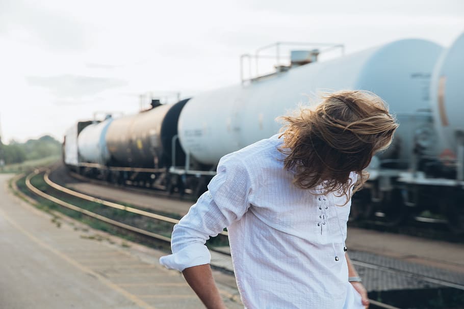 long, haired, caucasian man, standing, passing, train, 20-25 year old, Blur, Platform, Railroad