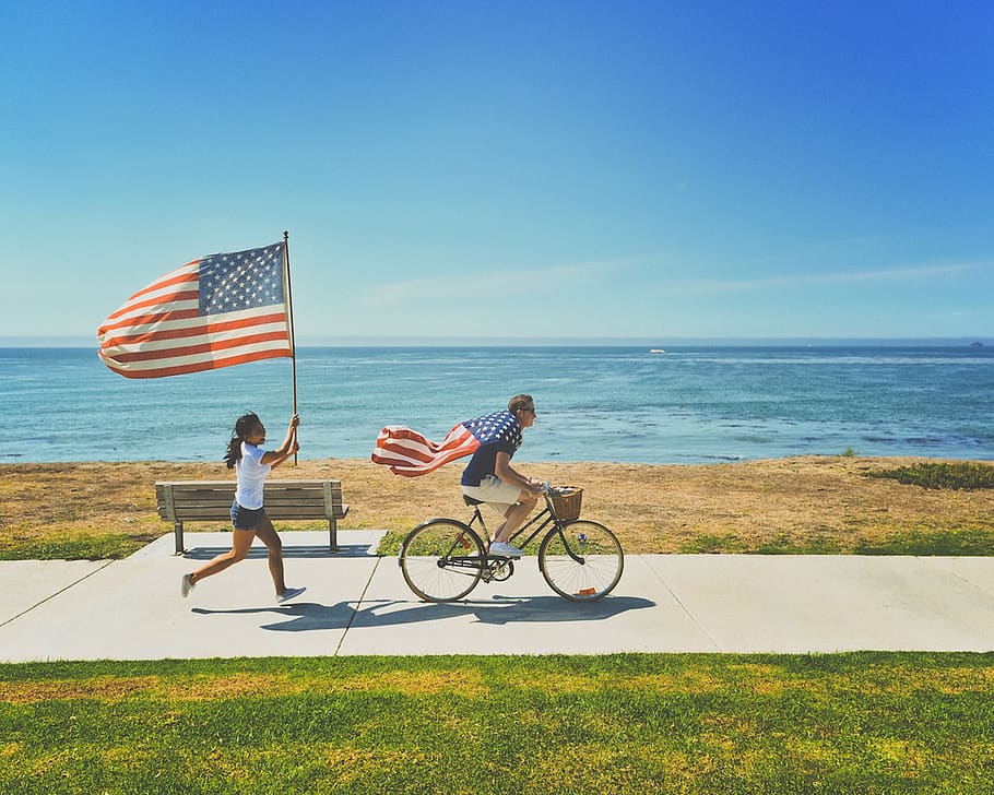 american flags, beach, bench, bicycle, bike, coast, fourth of july, dom, fun, ocean