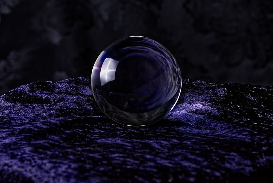 crystal ball-photography, ball, lights, indoors, glass - material, close-up, selective focus, still life, transparent, purple