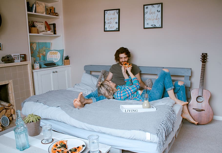room, bed, indoor, people, couple, man, woman, guitar, food, eating