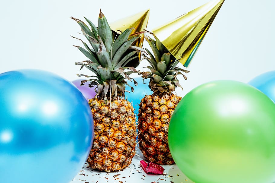 pineapple, pineapples, party hats, party, balloons, confetti, gold, golden, happy birthday, celebration