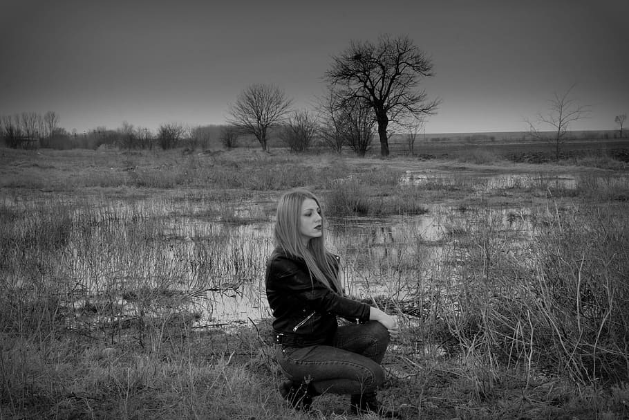 pose, girl, woman, portrait, grey, caption, one person, sitting, plant, field