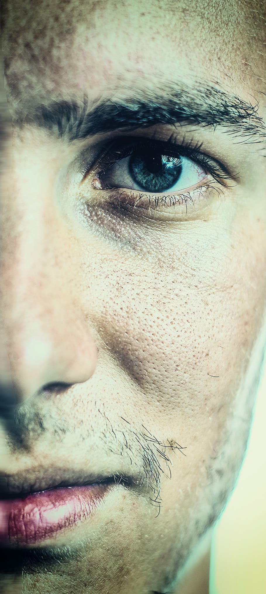 half face, portrait, young, head, person, man, one person, human body part, close-up, looking at camera