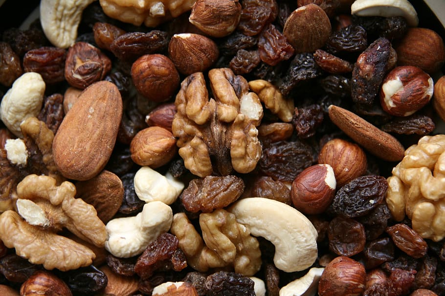 nuts, food, trail mix, raisins, cashew, hazelnuts, walnuts, food and drink, nut, large group of objects