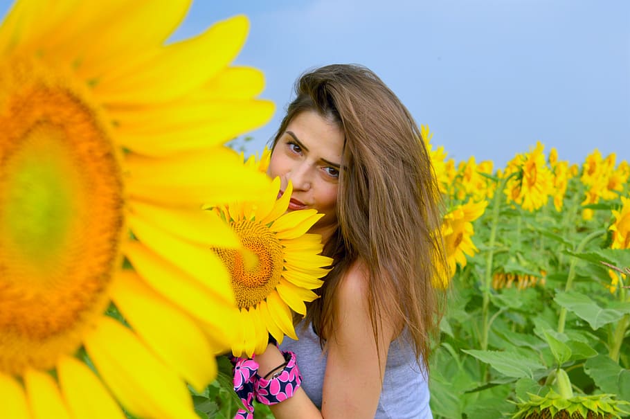 sunflower, woman, field, flowers, playful, girl, yellow, flower, plant, one person