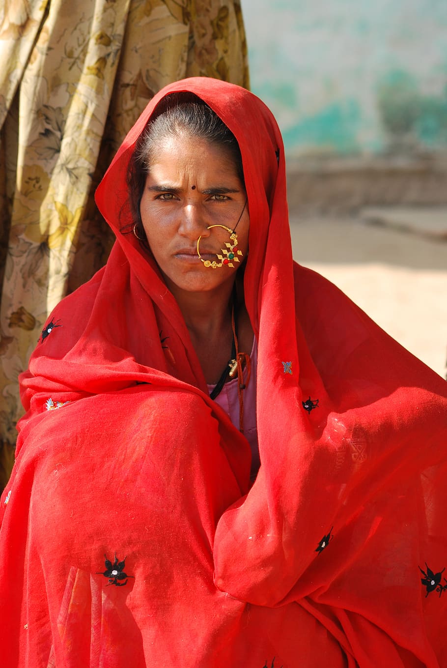 woman, village, red clothing, cultural, countryside, india, pensive, jewelry, one person, real people