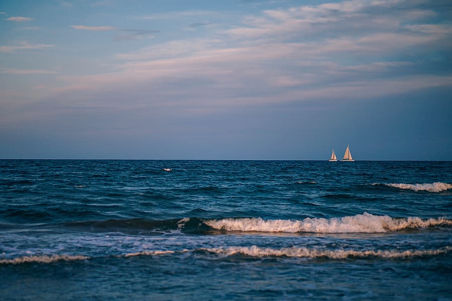 two tiny boats, sea, water, sky, horizon, horizon over water, beauty in nature, scenics - nature, nautical vessel, cloud - sky