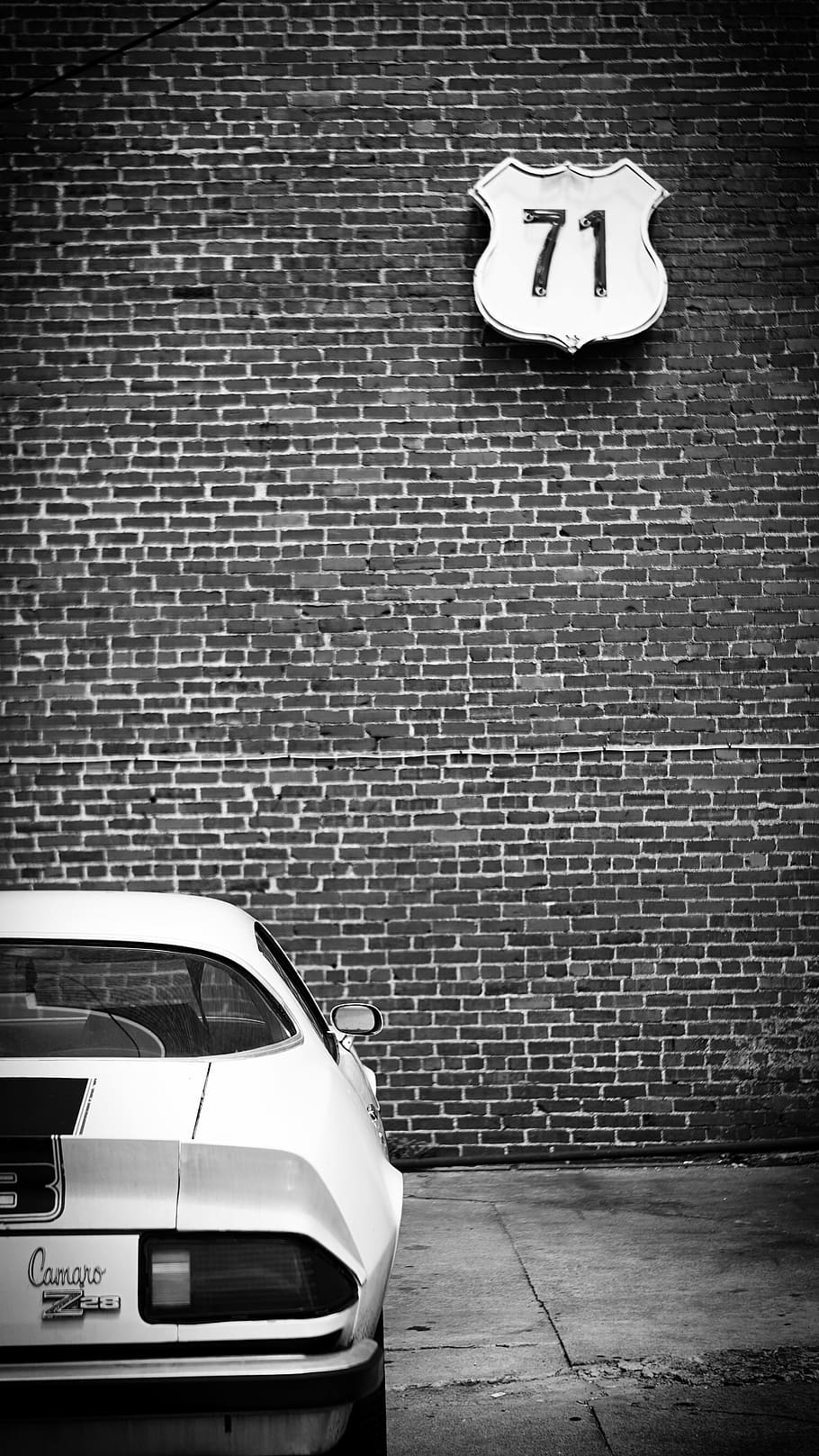 camaro, car, black and white, transport, vintage, retro, brick, wall, city, street
