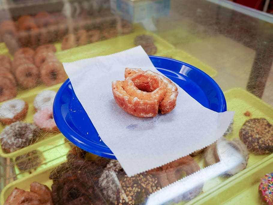 glazed, cake donut, sitting, blue, plate, inside, shop., bakery, breakfast, calories