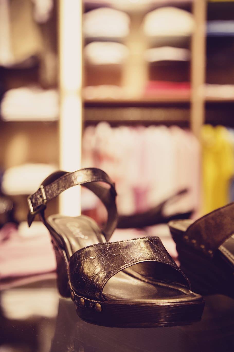 shoe, footwear, sandals, reflection, indoors, metal, close-up, focus on foreground, shelf, domestic room