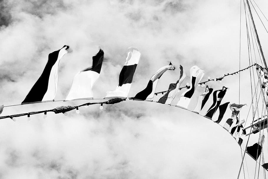 black and white, flags, string, fairy lights, ropes, sailboat, sky, clouds, low angle view, cloud - sky