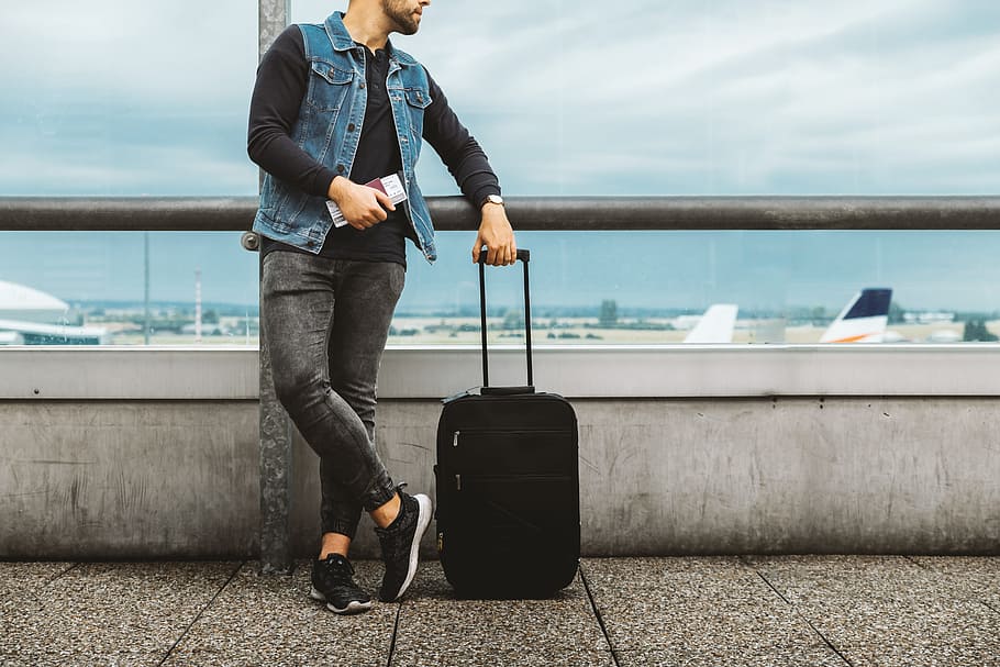 calm, male, tourist, standing, outdoor, airport, looking, airplanes., one person, travel