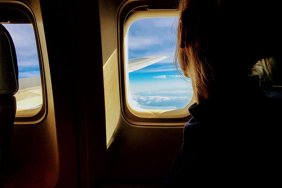 people, woman, airplane, travel, adventure, vacation, trip, aerial, wing, clouds
