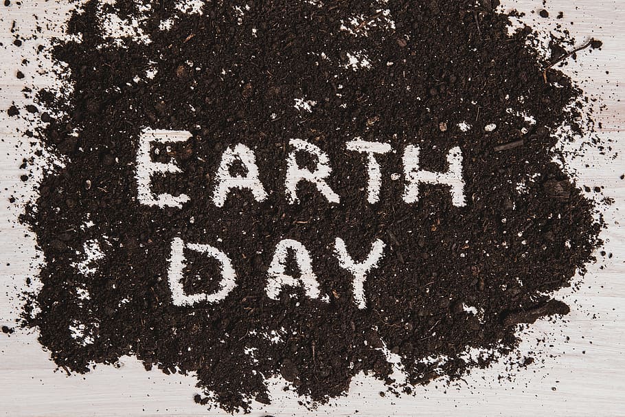 text earth day, written, dark, soil, white, wooden, surface, convey, message, conserve