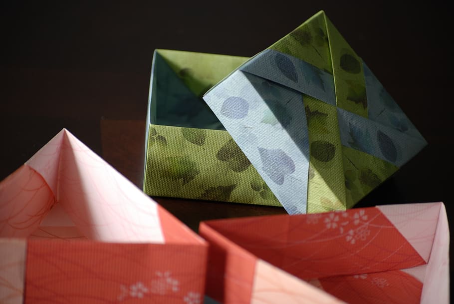 origami, papercrafting, origami boxes, paper, still life, art and craft, black background, close-up, studio shot, shape