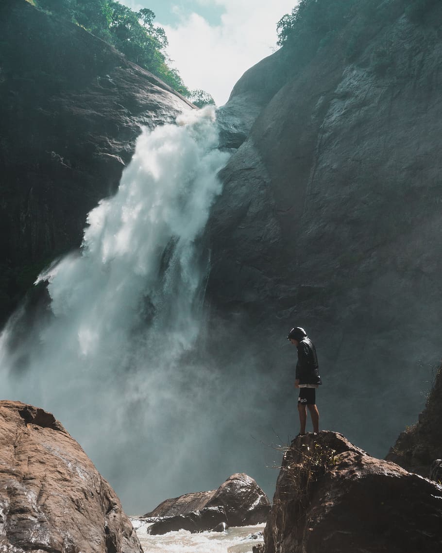 man, rocks, waterfall, male, adventure, jacket, wet, river, cliff, splash